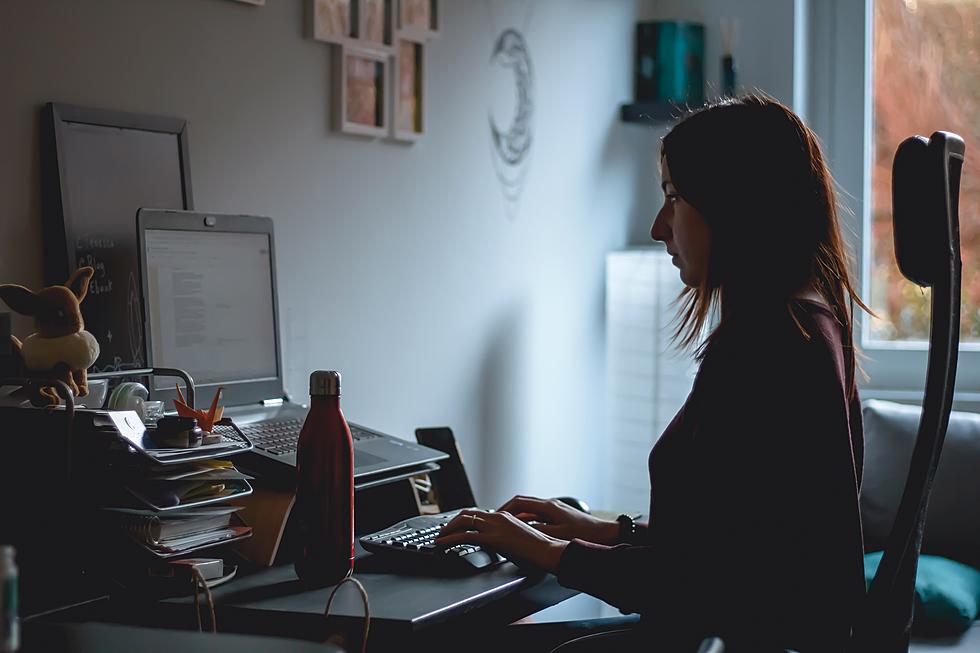 Woman working at a computer